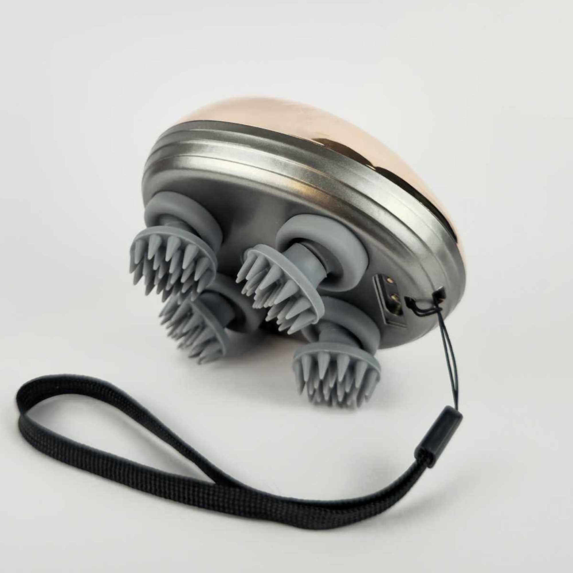 electric-head-massager-silver-angled-view.jpg	