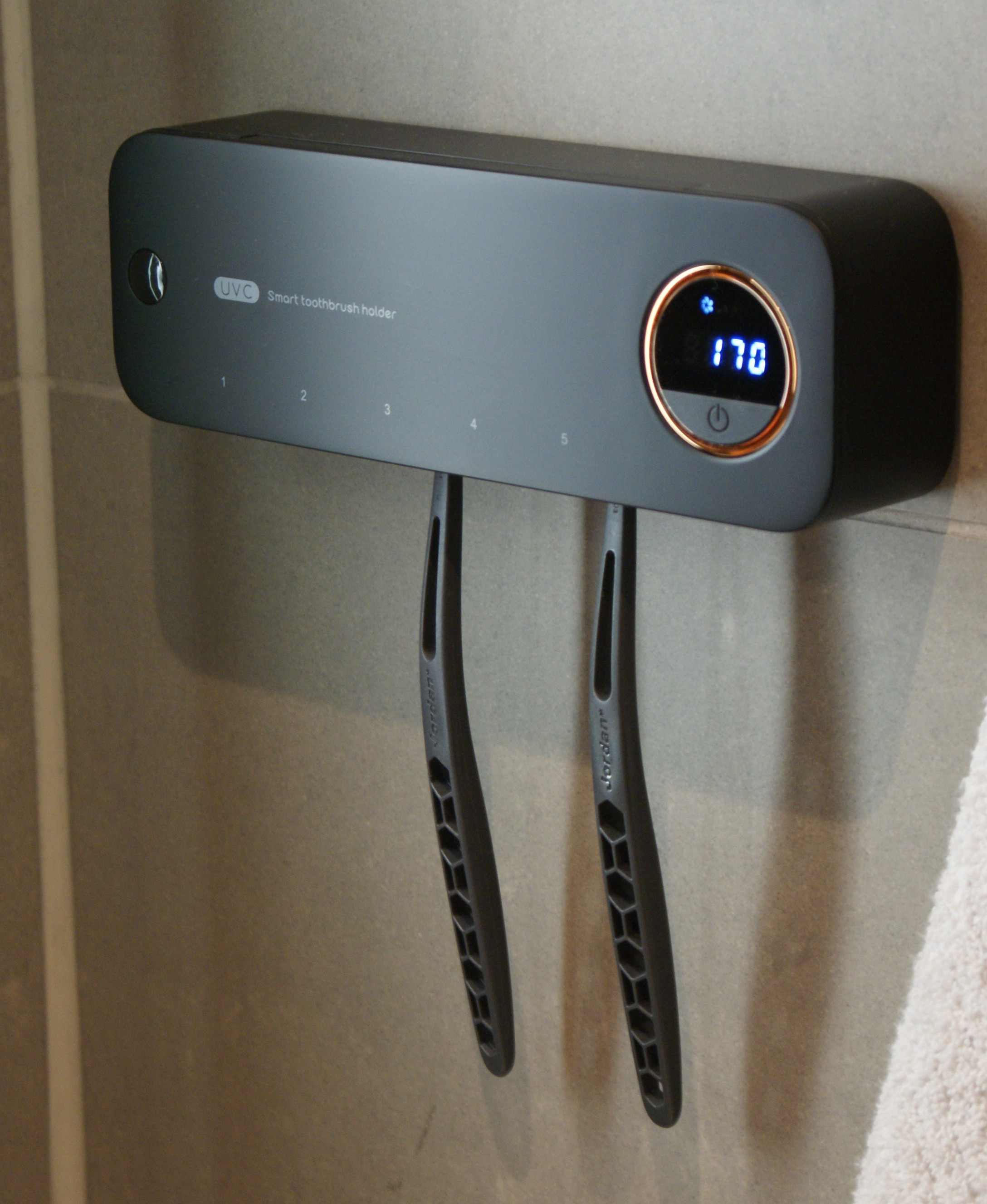 Toothbrush-Holder-Black-Wall-With-Toothbrushes